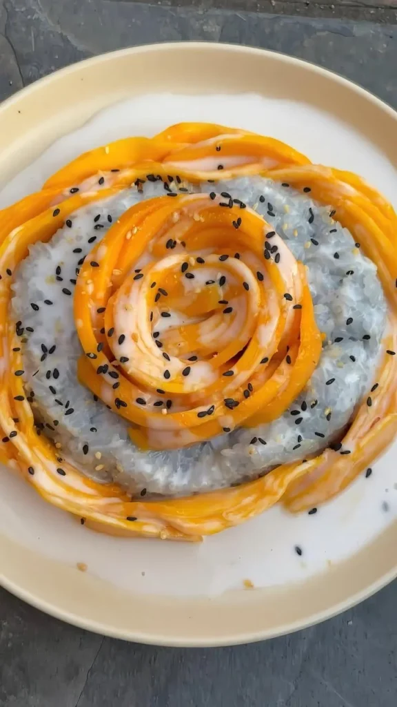 Delicious serving of Mango Sticky Rice, a popular Thai dessert with mango and coconut